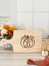 Load image into Gallery viewer, Engraved Pumpkin Monogram Charcuterie Board
